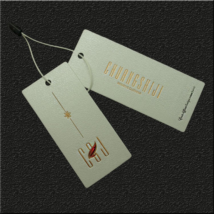 厂家批发新款特种纸烫金吊牌 女装吊卡免费设计辅料定做服装标签